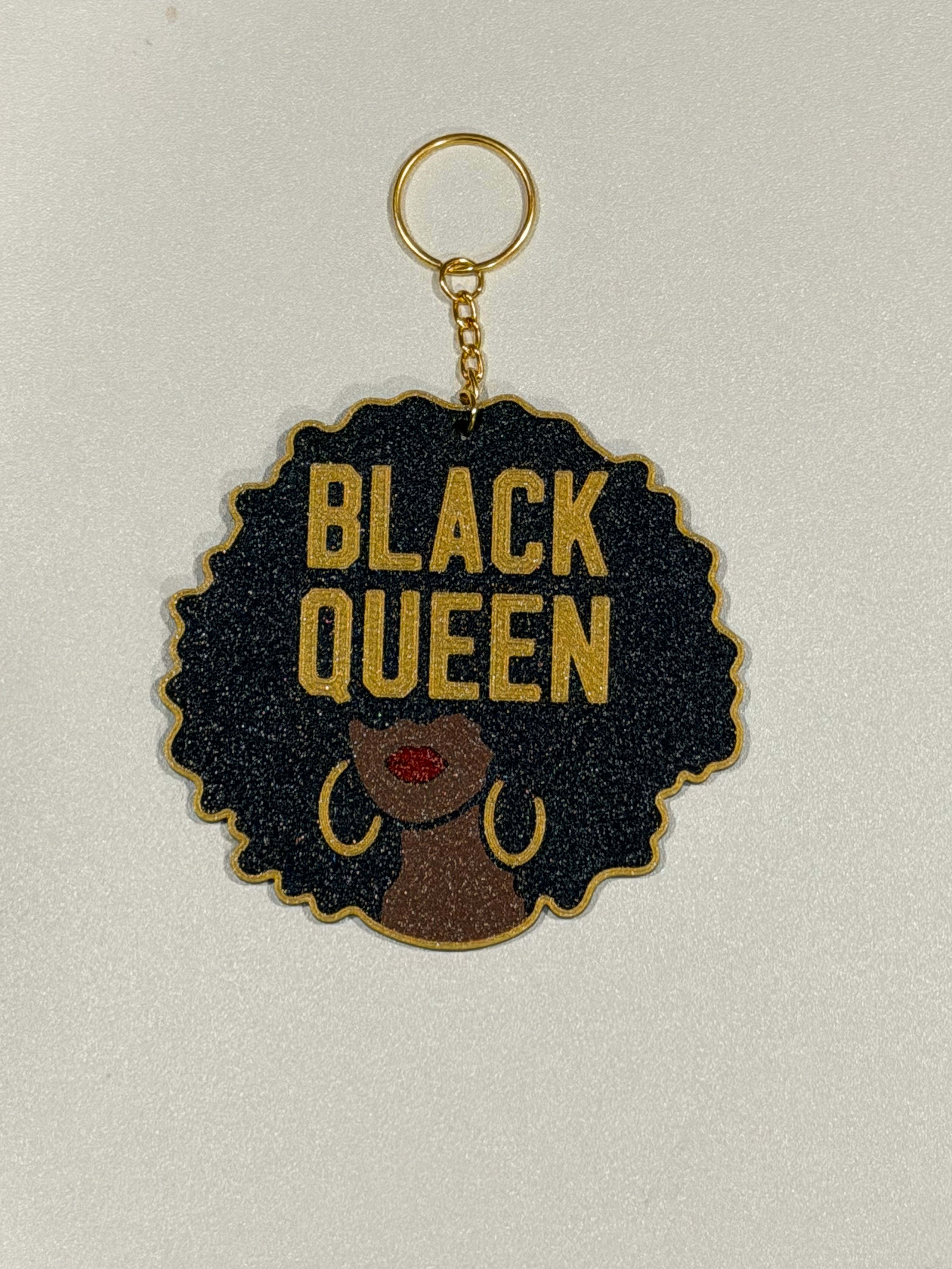 Oversized 4-inch Black Queen Luxe 3D printed keychain with afro silhouette, gold lettering, gold hoop earrings, red lips, and gold keyring